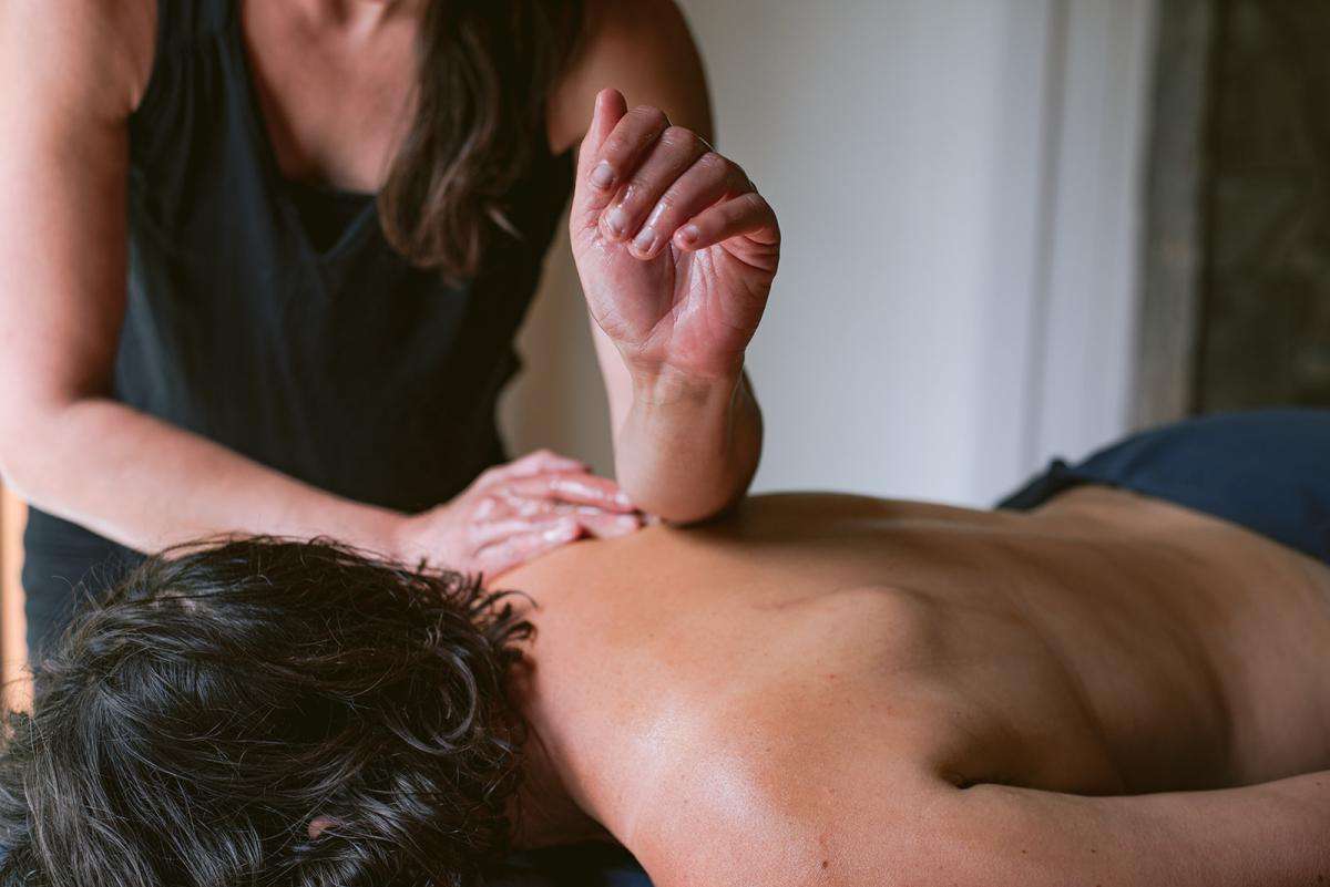 A woman receiving a massage services