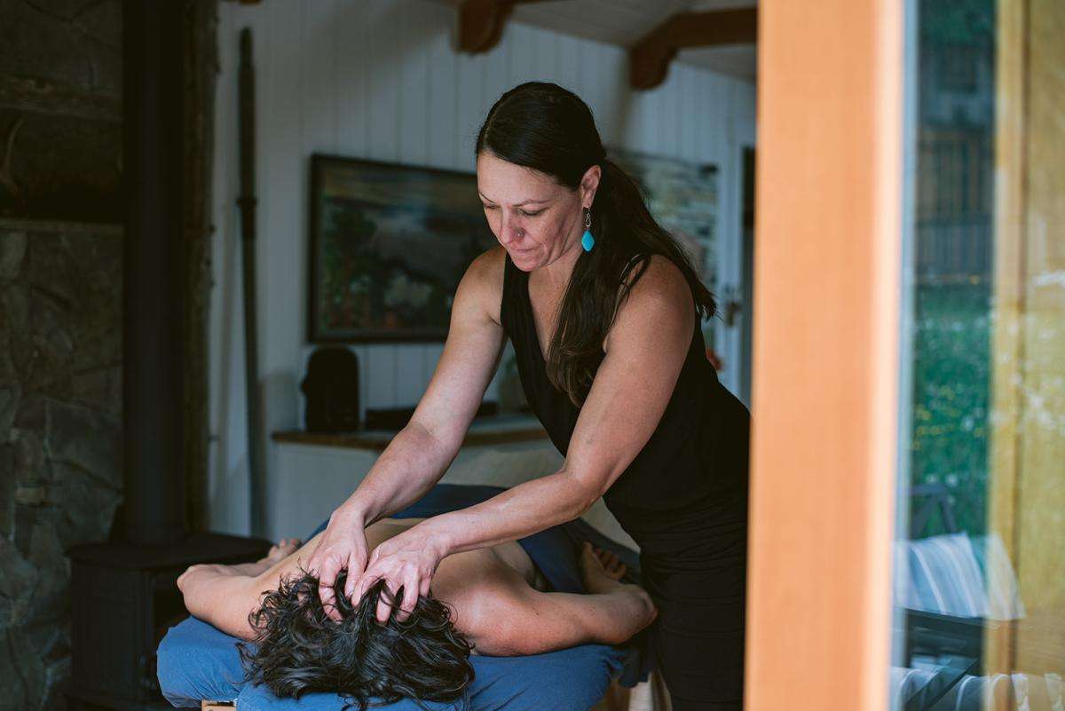 A woman receiving a massage services