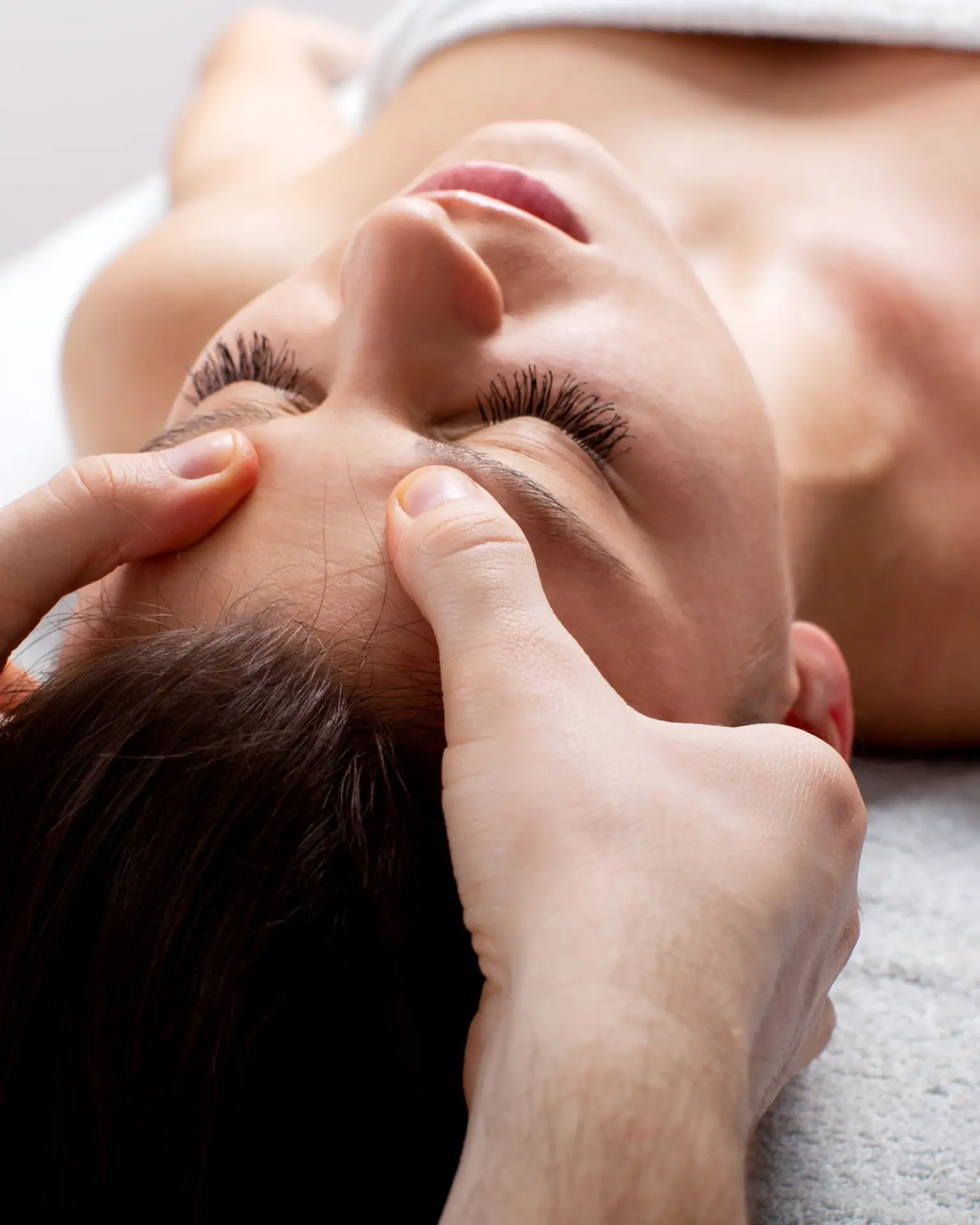 A woman receiving a massage services